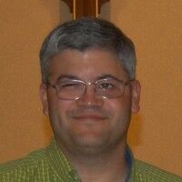 Headshot of Aron Buechler.